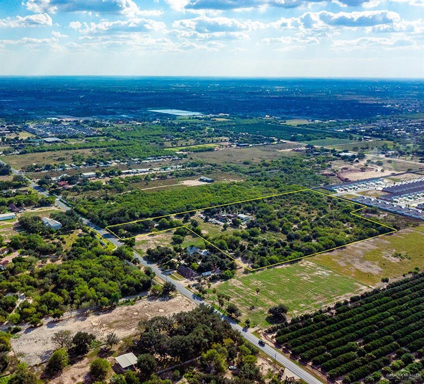 6807 North Taylor Road Mission, TX 78573 - Photo 6 of 6 a view of an ocean and a yard