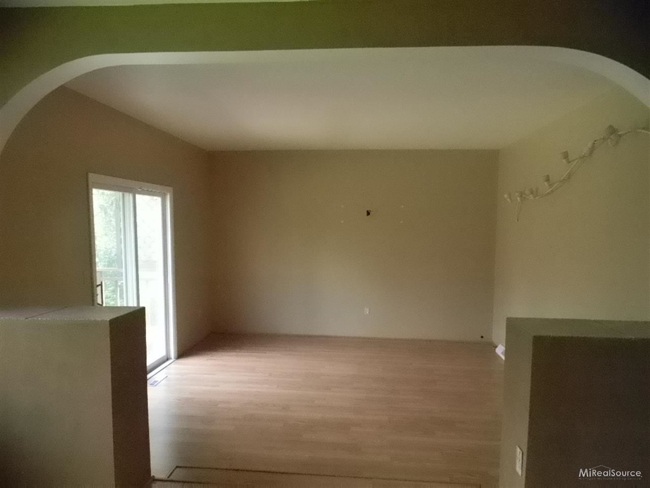 7450 Clement Road Clarkston, MI 48346 - Photo 6 of 12 FAMILY ROOM