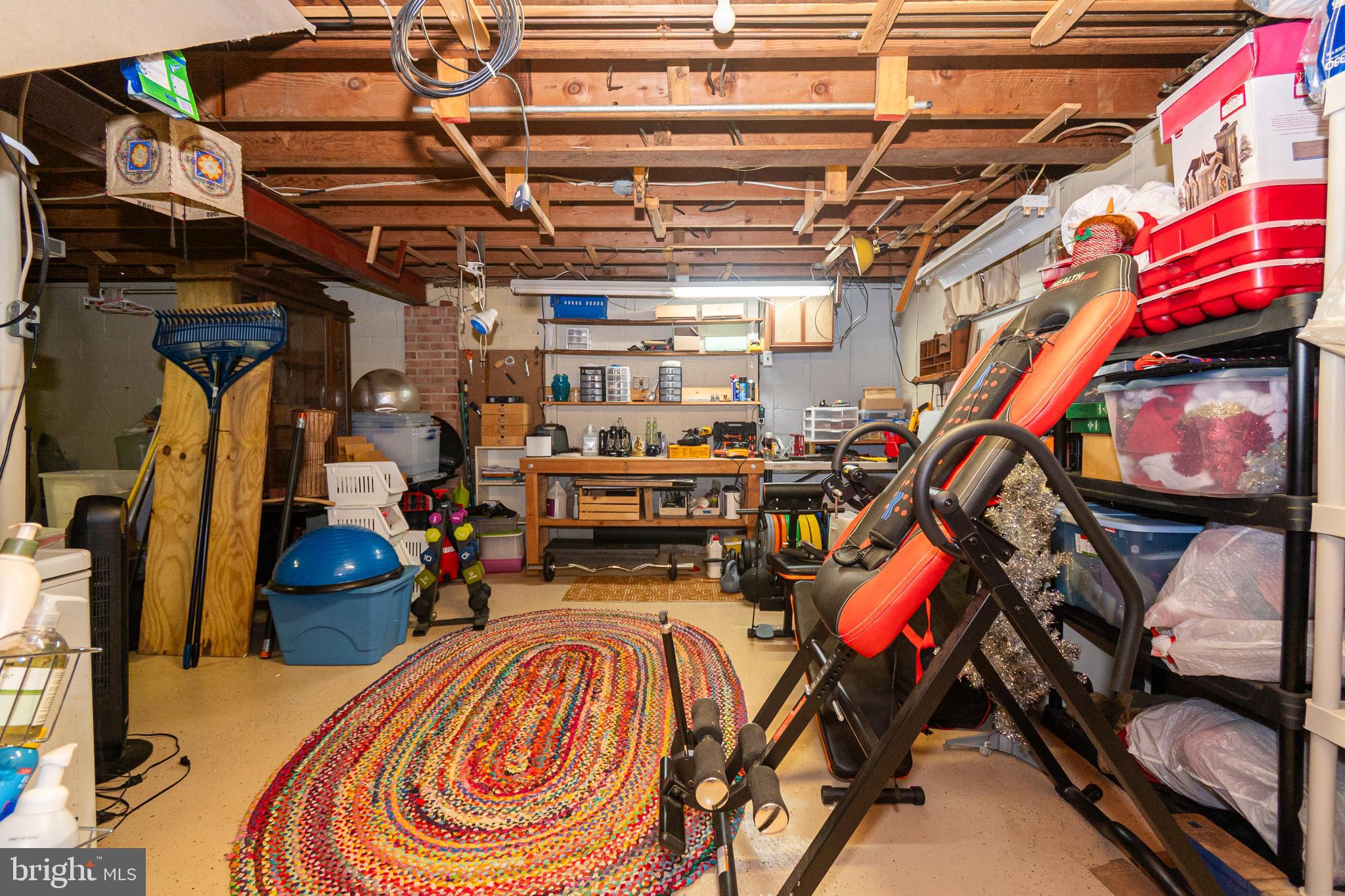 16308 Brandywine Road Brandywine, MD 20613 - Photo 17 of 27 a view of an chairs room with gym equipment