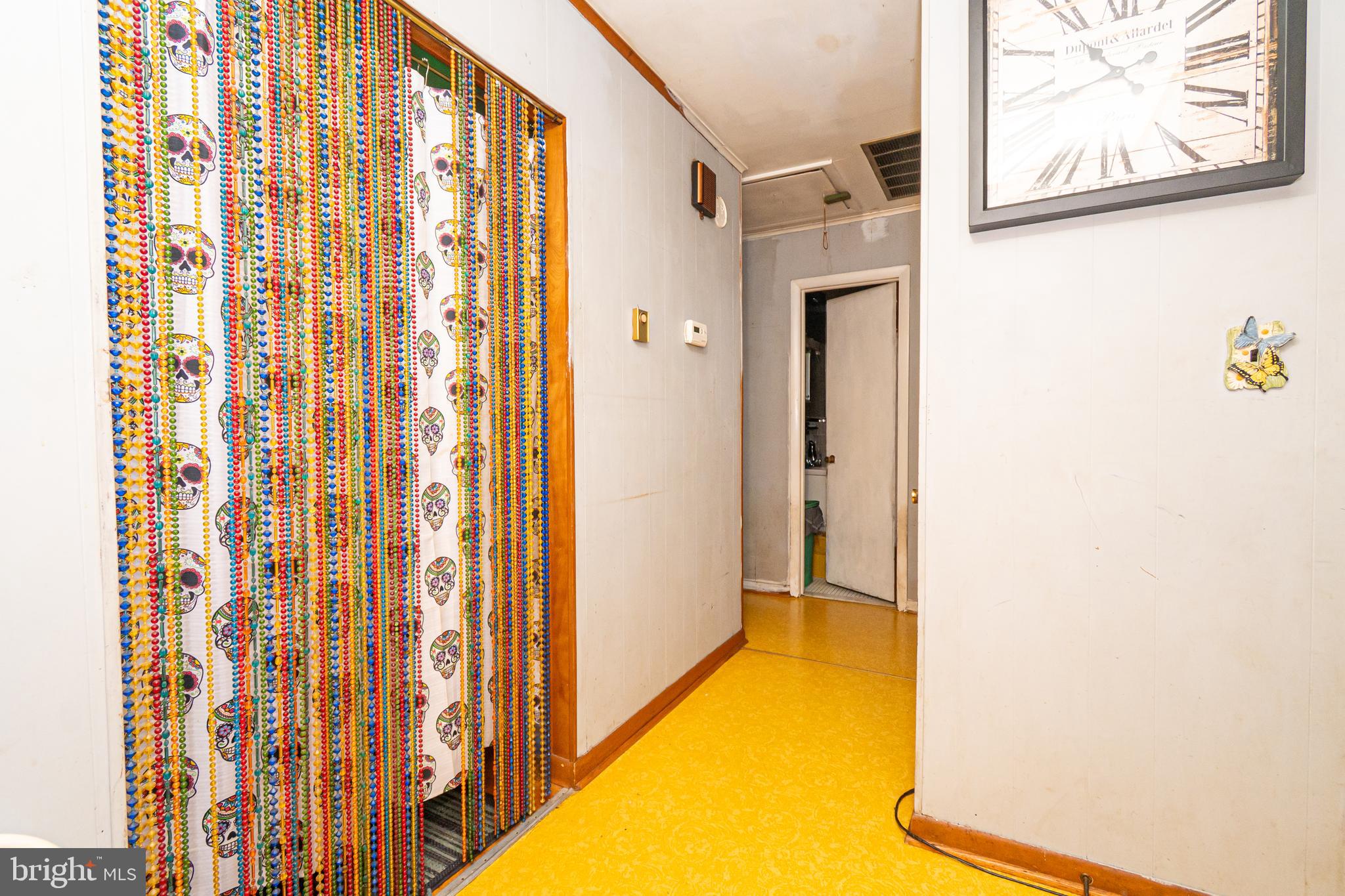16308 Brandywine Road Brandywine, MD 20613 - Photo 18 of 27 a view of a bathroom with a bathtub and a shower curtain