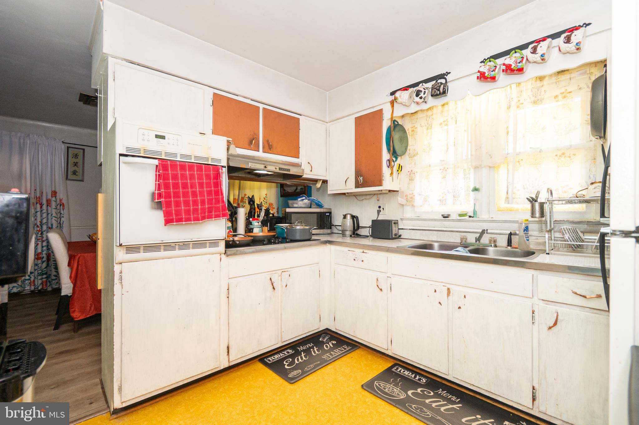 16308 Brandywine Road Brandywine, MD 20613 - Photo 2 of 27 a kitchen with stainless steel appliances granite countertop a sink and a refrigerator