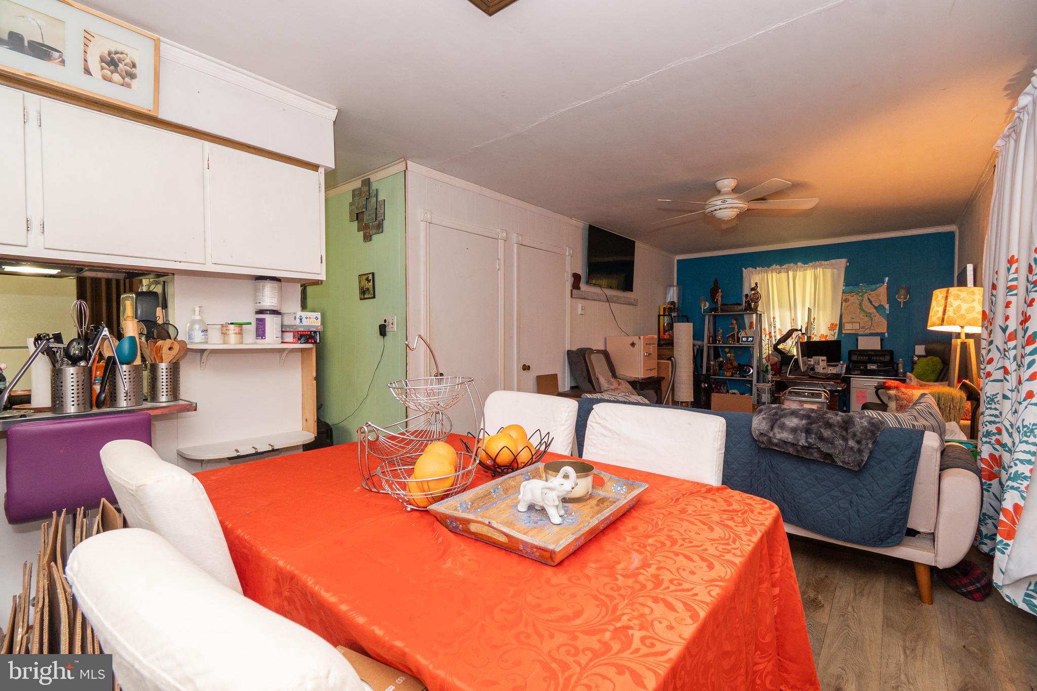 16308 Brandywine Road Brandywine, MD 20613 - Photo 5 of 27 a living room with furniture a wooden floor and a large window