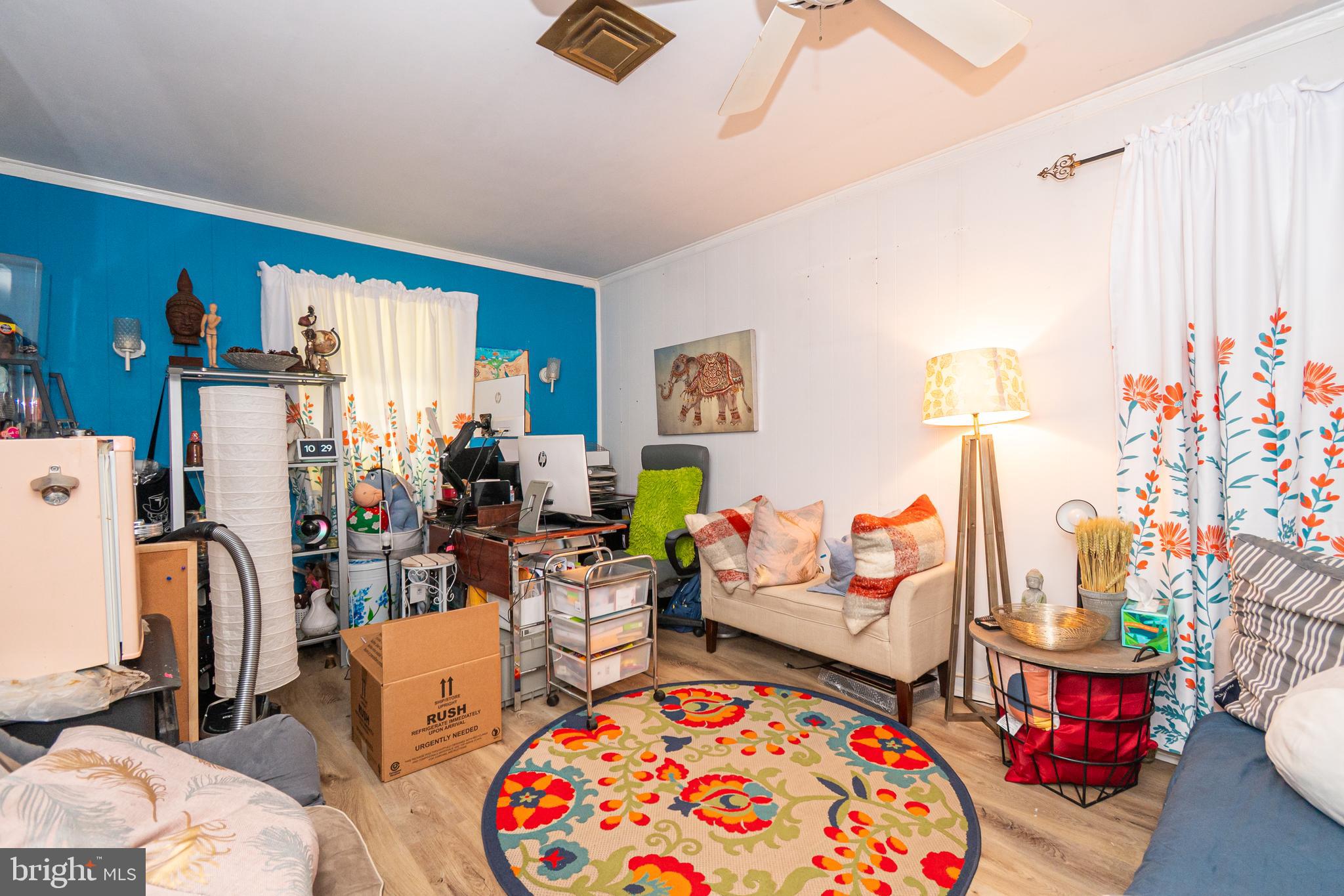 16308 Brandywine Road Brandywine, MD 20613 - Photo 6 of 27 a living room with furniture and a table