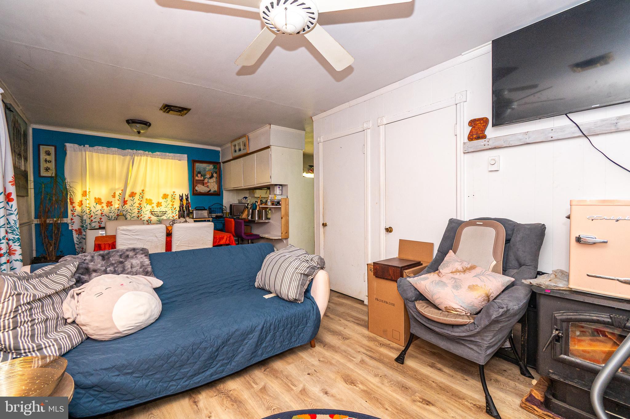 16308 Brandywine Road Brandywine, MD 20613 - Photo 7 of 27 a living room with furniture fireplace and a large window