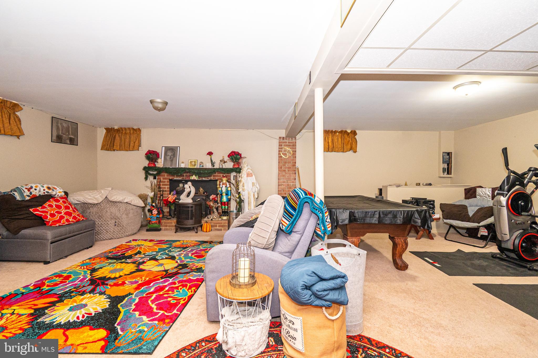 16308 Brandywine Road Brandywine, MD 20613 - Photo 8 of 27 a living room with furniture and a table