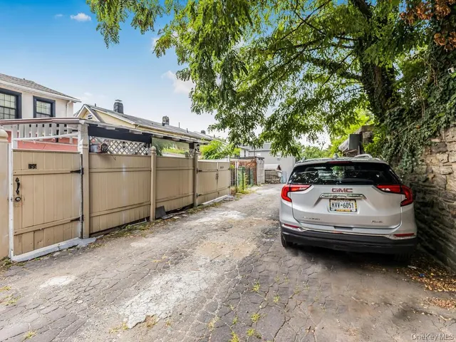 a view of a house with a back yard