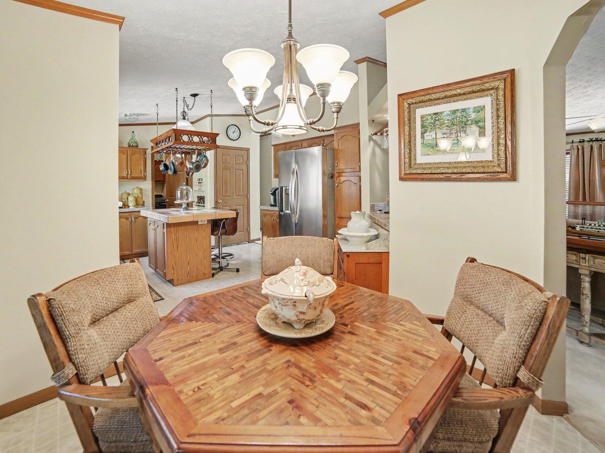 4905 Wayne Road Pentwater, MI 49449 - Photo 11 of 35 Dining to kitchen