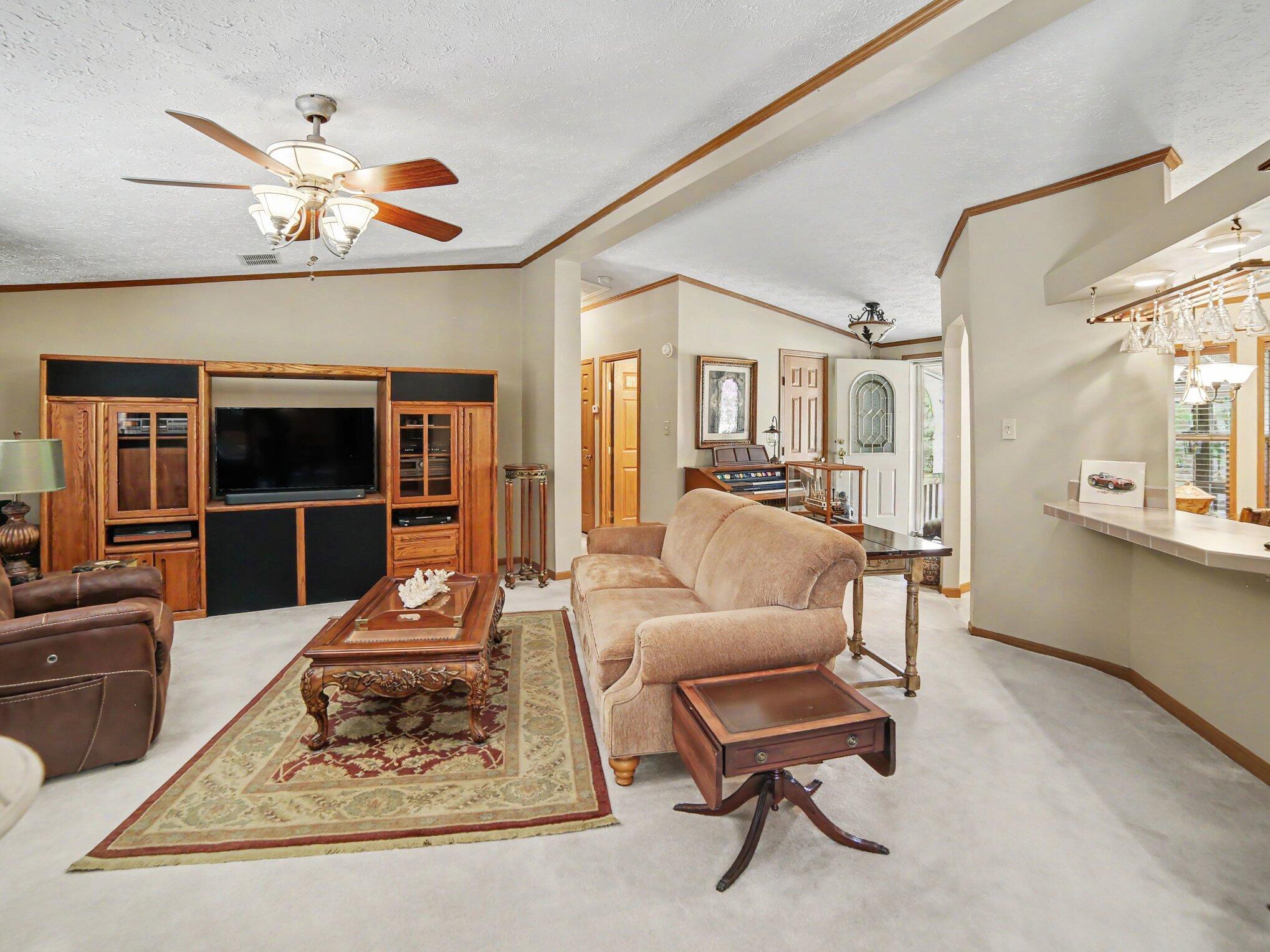 4905 Wayne Road Pentwater, MI 49449 - Photo 4 of 35 Living room from entry