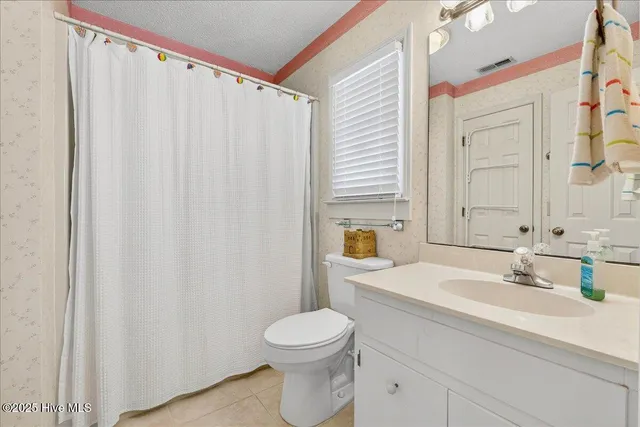 $475,000 | 142 Brunswick Avenue East, Unit B, Holden Beach, NC 28462