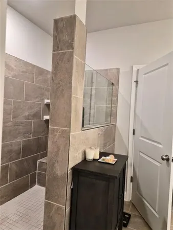 a room with furniture and a mirror