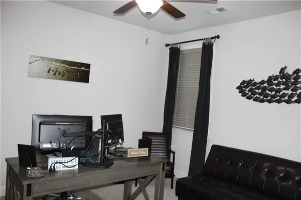 a bathroom with a double vanity sink toilet and shower