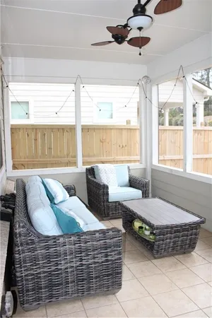 a front view of a house with a large window