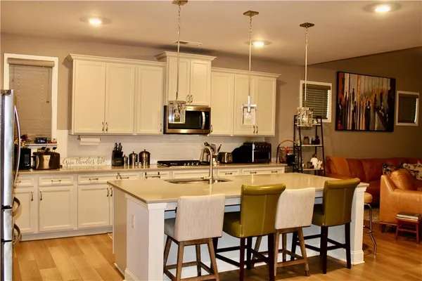 a large kitchen with cabinets