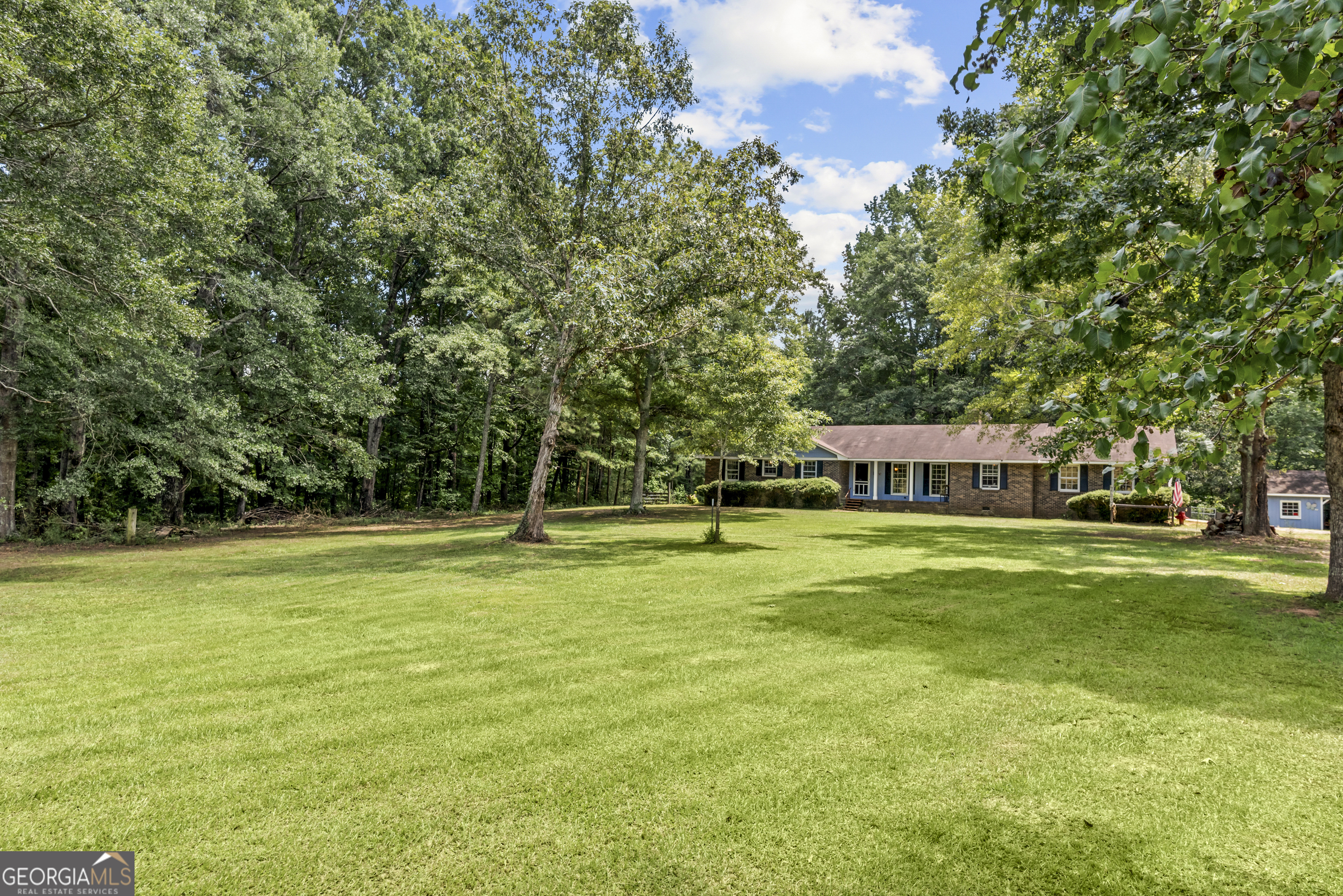 1151 Fears Road Rutledge, GA 30663 - Photo 1 of 1 a view of a house with a big yard