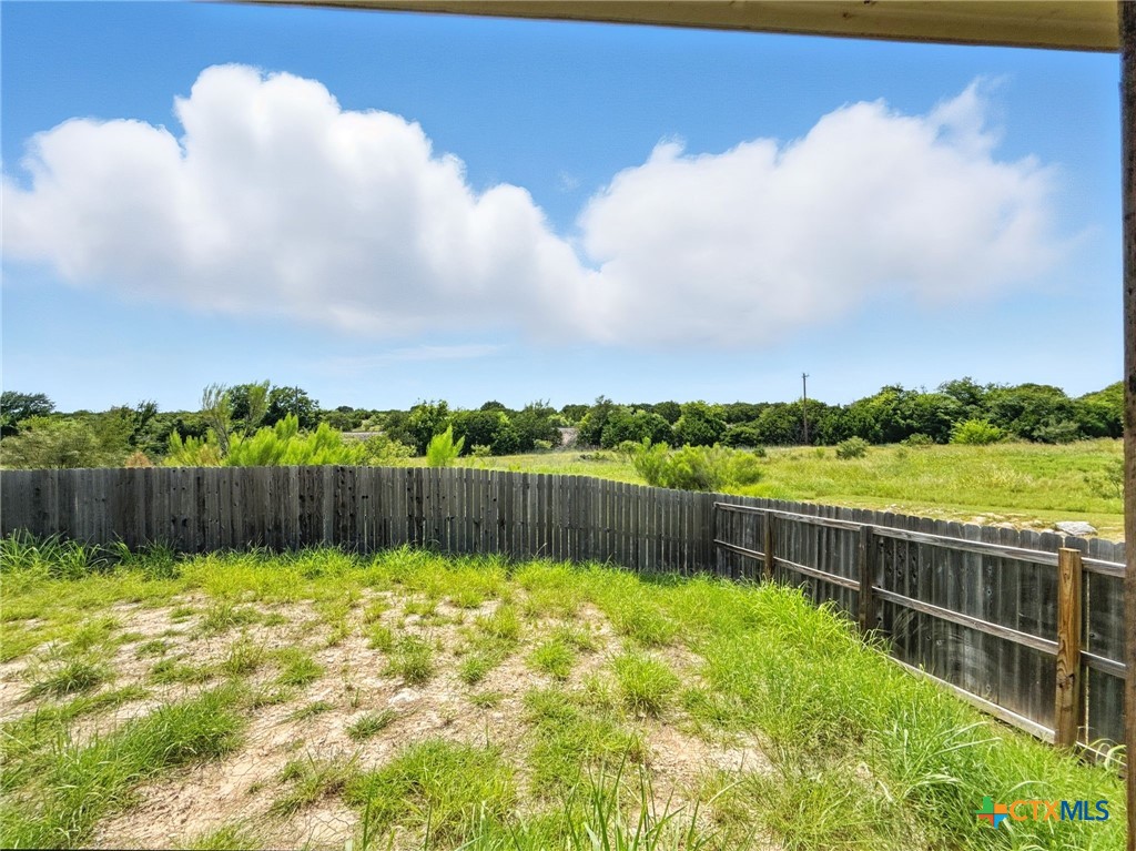 2701 Settlement Road Copperas Cove, TX 76522 - Photo 17 of 18 a view of a backyard with a lake view