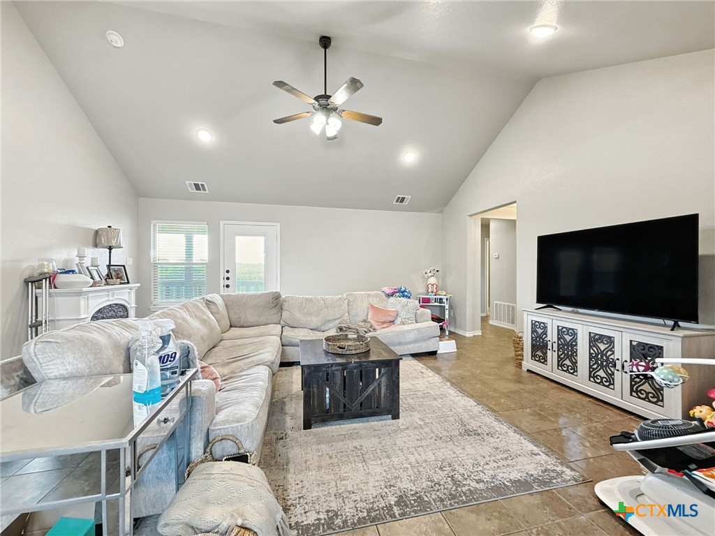 2701 Settlement Road Copperas Cove, TX 76522 - Photo 10 of 18 a living room with furniture and a flat screen tv
