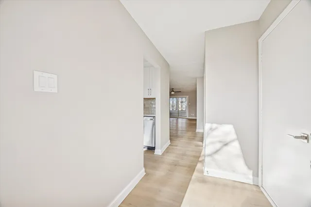 a kitchen with stainless steel appliances granite countertop a refrigerator stove and sink