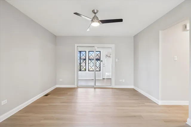 a view of an empty room and window