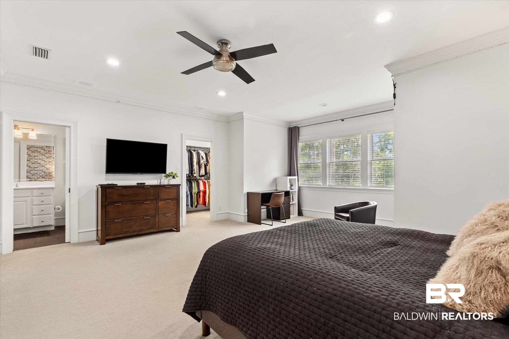 8561 Dawes Lake Road Mobile, AL 36619 - Photo 26 of 63 Bedroom featuring ornamental molding, recessed lighting, a walk in closet, light colored carpet, and a closet