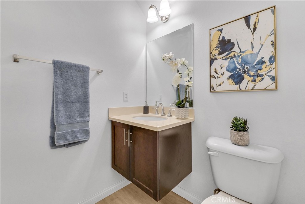 719 Huron Place Claremont, CA 91711 - Photo 11 of 37 a bathroom with a sink a toilet and a mirror