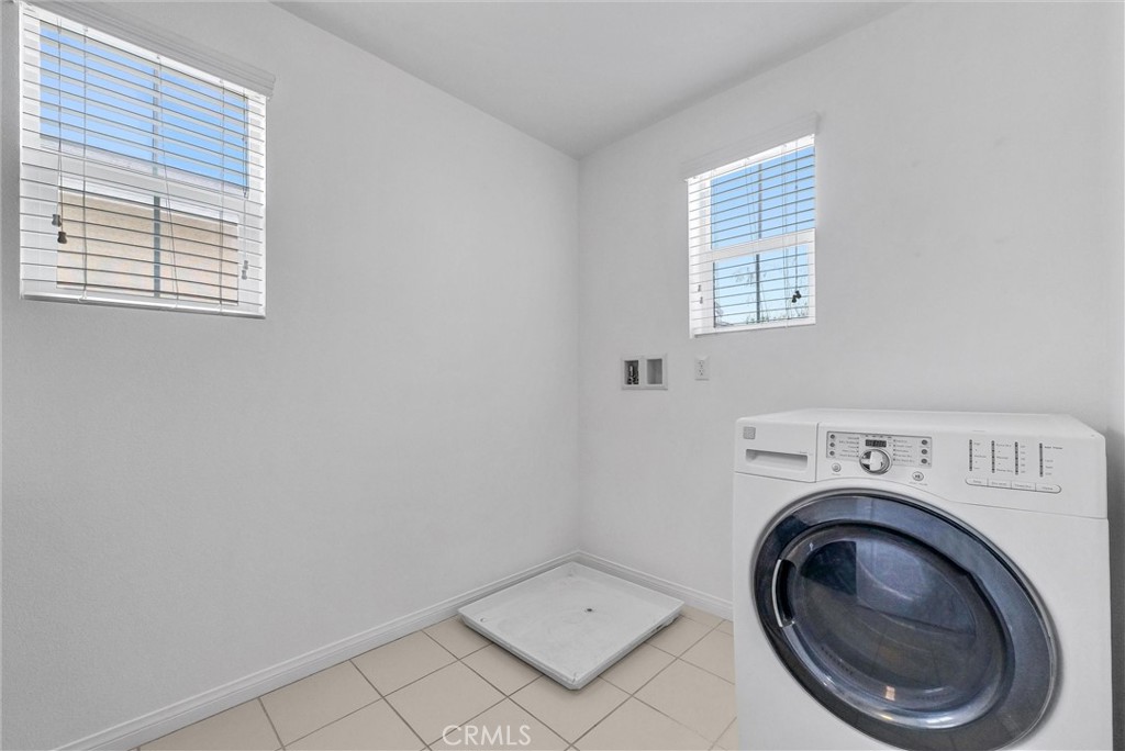 719 Huron Place Claremont, CA 91711 - Photo 13 of 37 a view of livingroom with washer and dryer