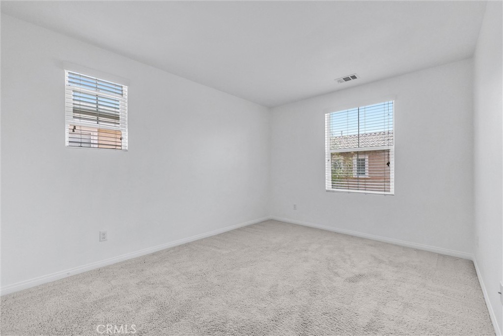 719 Huron Place Claremont, CA 91711 - Photo 15 of 37 an empty room with windows