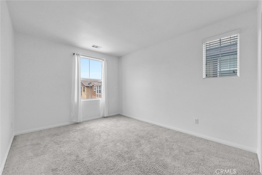 719 Huron Place Claremont, CA 91711 - Photo 17 of 37 a view of an empty room with a window