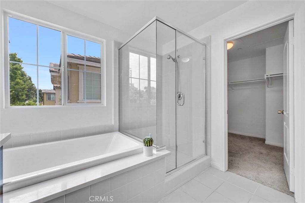 719 Huron Place Claremont, CA 91711 - Photo 24 of 37 a bathroom with a bathtub and a shower