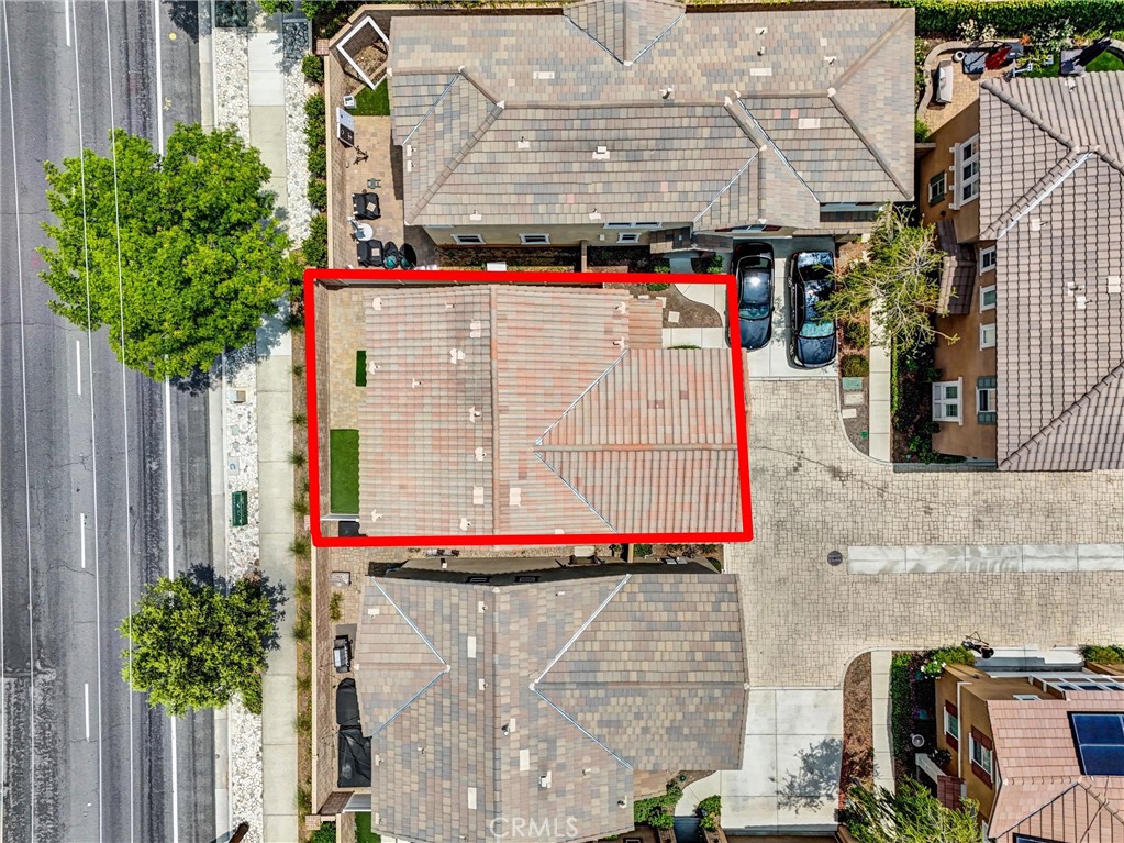 719 Huron Place Claremont, CA 91711 - Photo 29 of 37 a small white building sitting next to a street