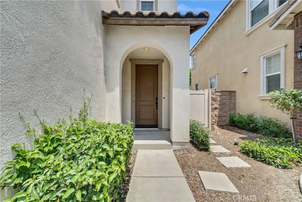 719 Huron Place Claremont, CA 91711 - Photo 37 of 37 a front view of a house with garden