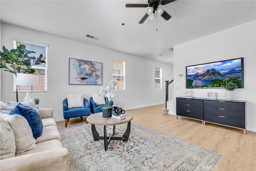 719 Huron Place Claremont, CA 91711 - Photo 5 of 37 a living room with furniture and a flat screen tv
