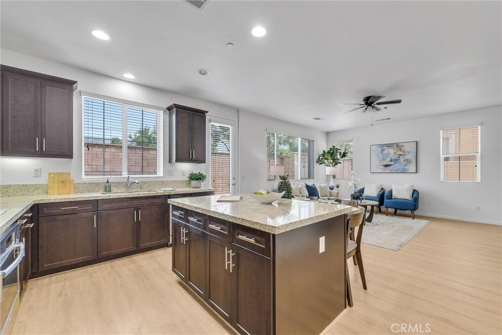 719 Huron Place Claremont, CA 91711 - Photo 8 of 37 a kitchen with sink and refrigerator