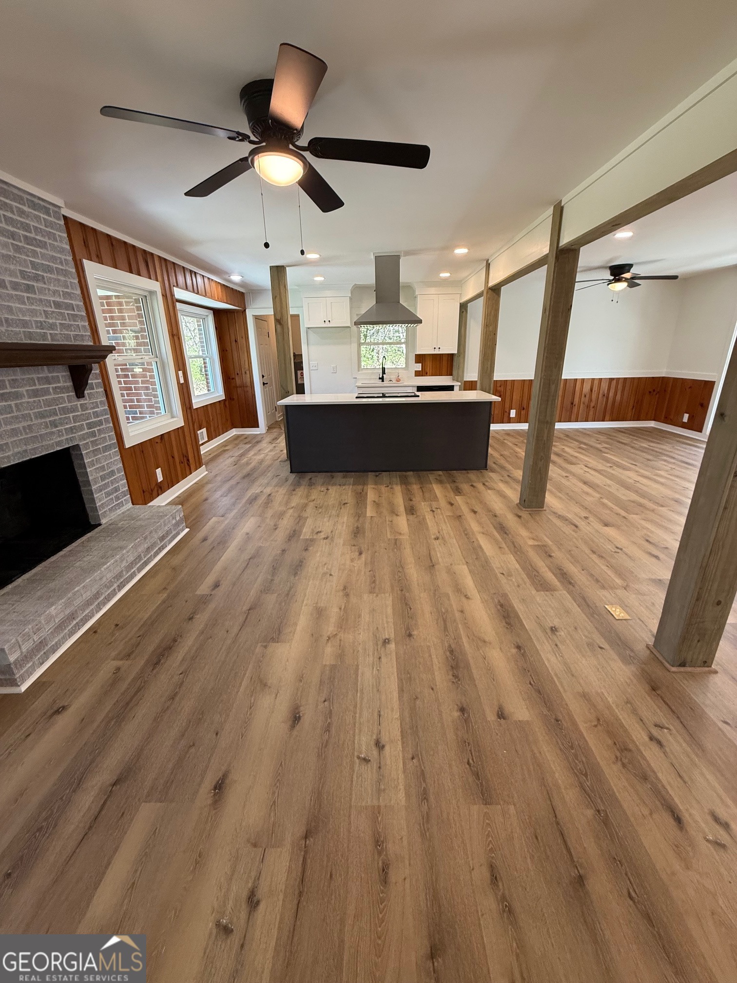 4005 Highway 85 Manchester, GA 31816 - Photo 12 of 41 a very nice looking room with a large window and wooden floor