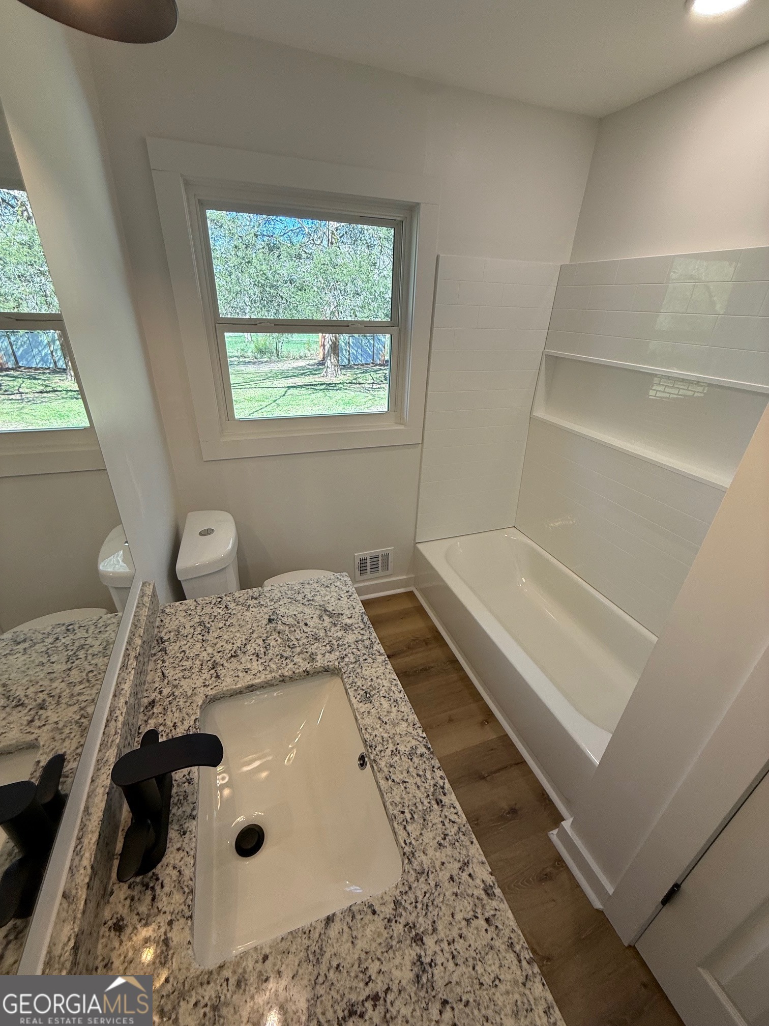 4005 Highway 85 Manchester, GA 31816 - Photo 17 of 41 a bath tub sitting next to a window