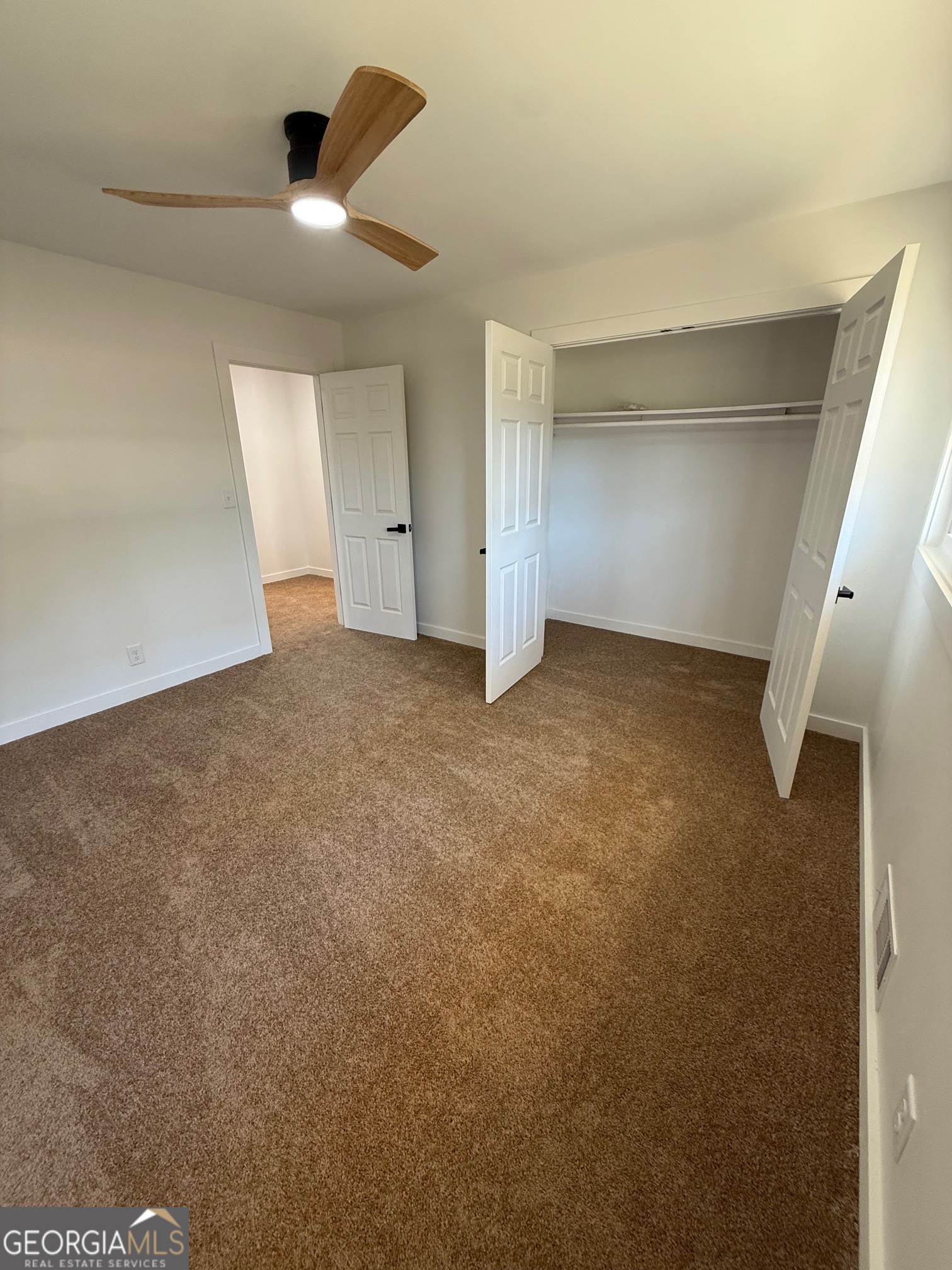 4005 Highway 85 Manchester, GA 31816 - Photo 20 of 41 wooden floor in an empty room with a window
