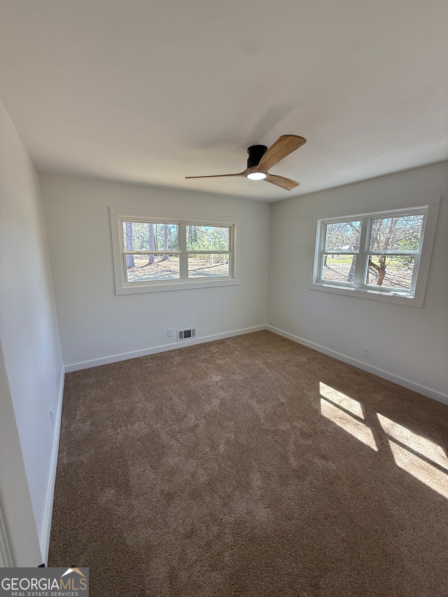 4005 Highway 85 Manchester, GA 31816 - Photo 21 of 41 a view of an empty room with a window