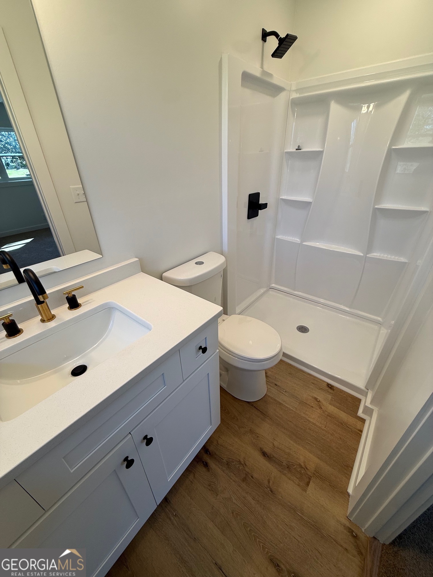 4005 Highway 85 Manchester, GA 31816 - Photo 25 of 41 a bathroom with a sink and a mirror