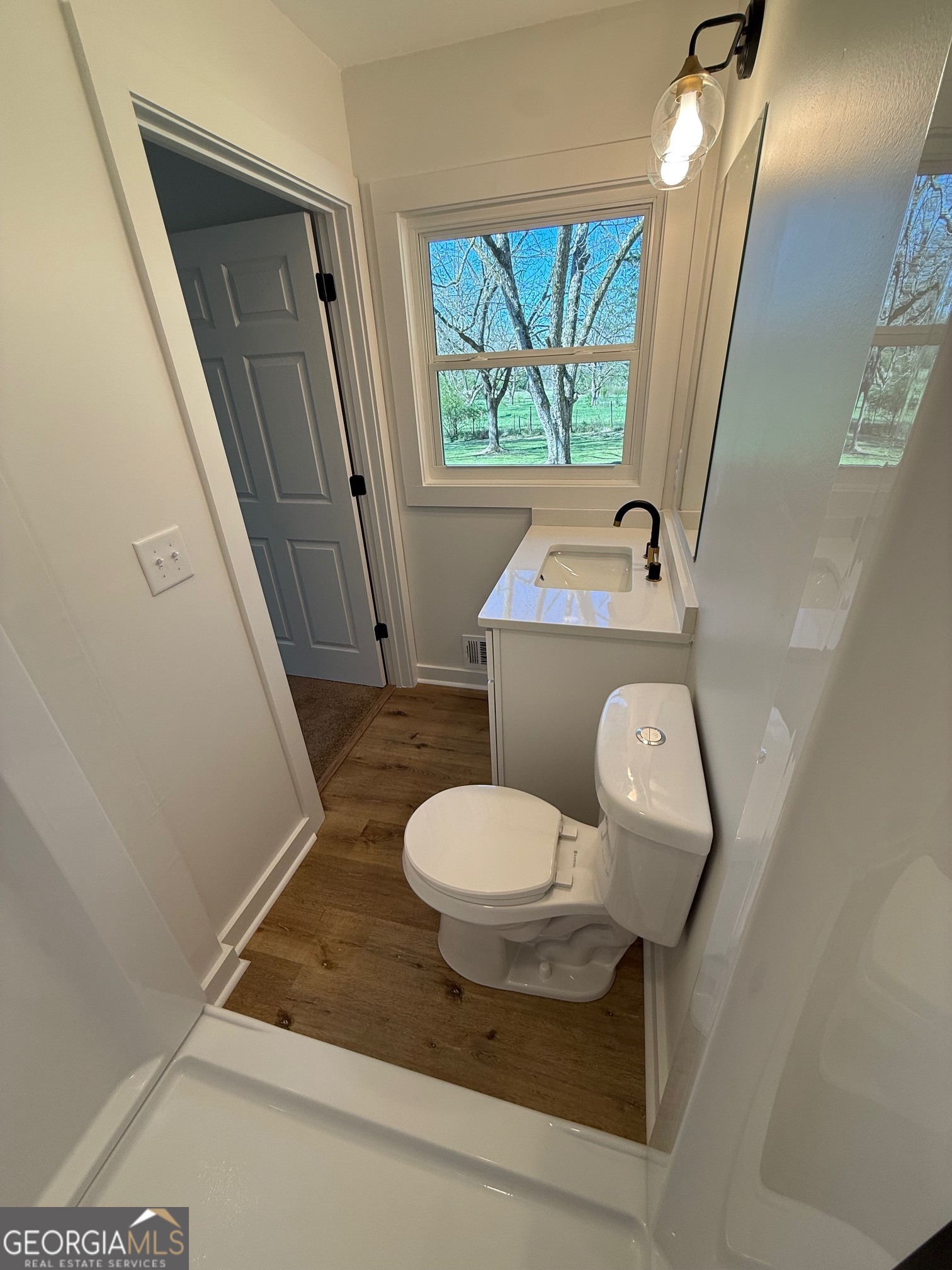 4005 Highway 85 Manchester, GA 31816 - Photo 26 of 41 a bathroom with a sink and a mirror