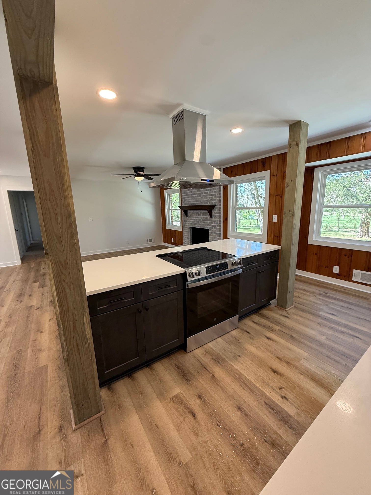 4005 Highway 85 Manchester, GA 31816 - Photo 7 of 41 a kitchen with stainless steel appliances granite countertop a stove a sink and a refrigerator