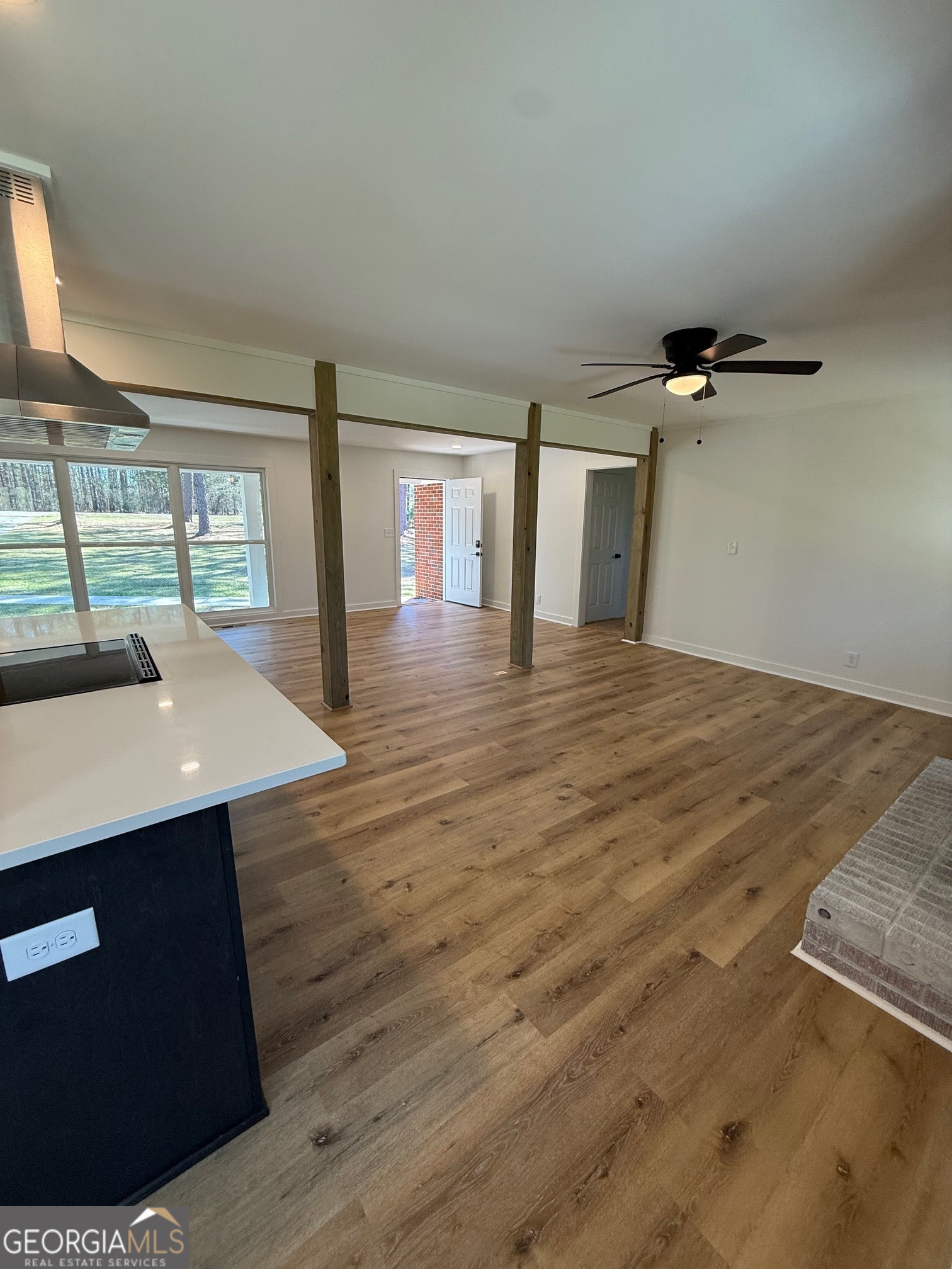 4005 Highway 85 Manchester, GA 31816 - Photo 9 of 41 wooden floor in an empty room with a window