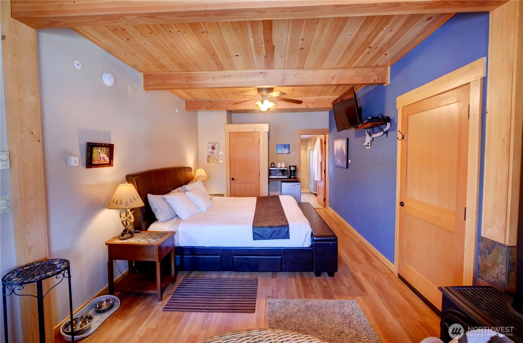 115 Johnson Street, Unit 1 2 3 Twisp, WA 98856 - Photo 13 of 40 a bed room with a bed and a window