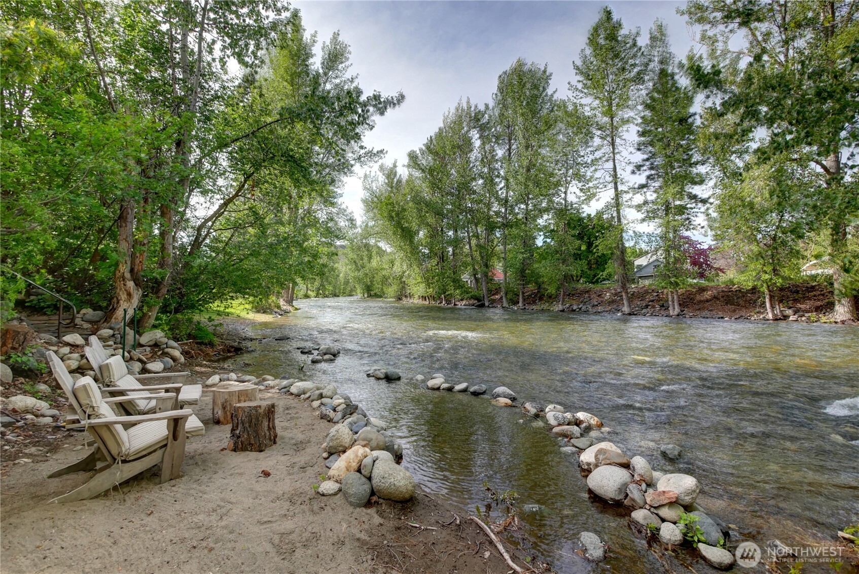 115 Johnson Street, Unit 1 2 3 Twisp, WA 98856 - Photo 40 of 40 a view of a lake with lots of trees