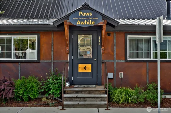 a view of a entryway door front of house