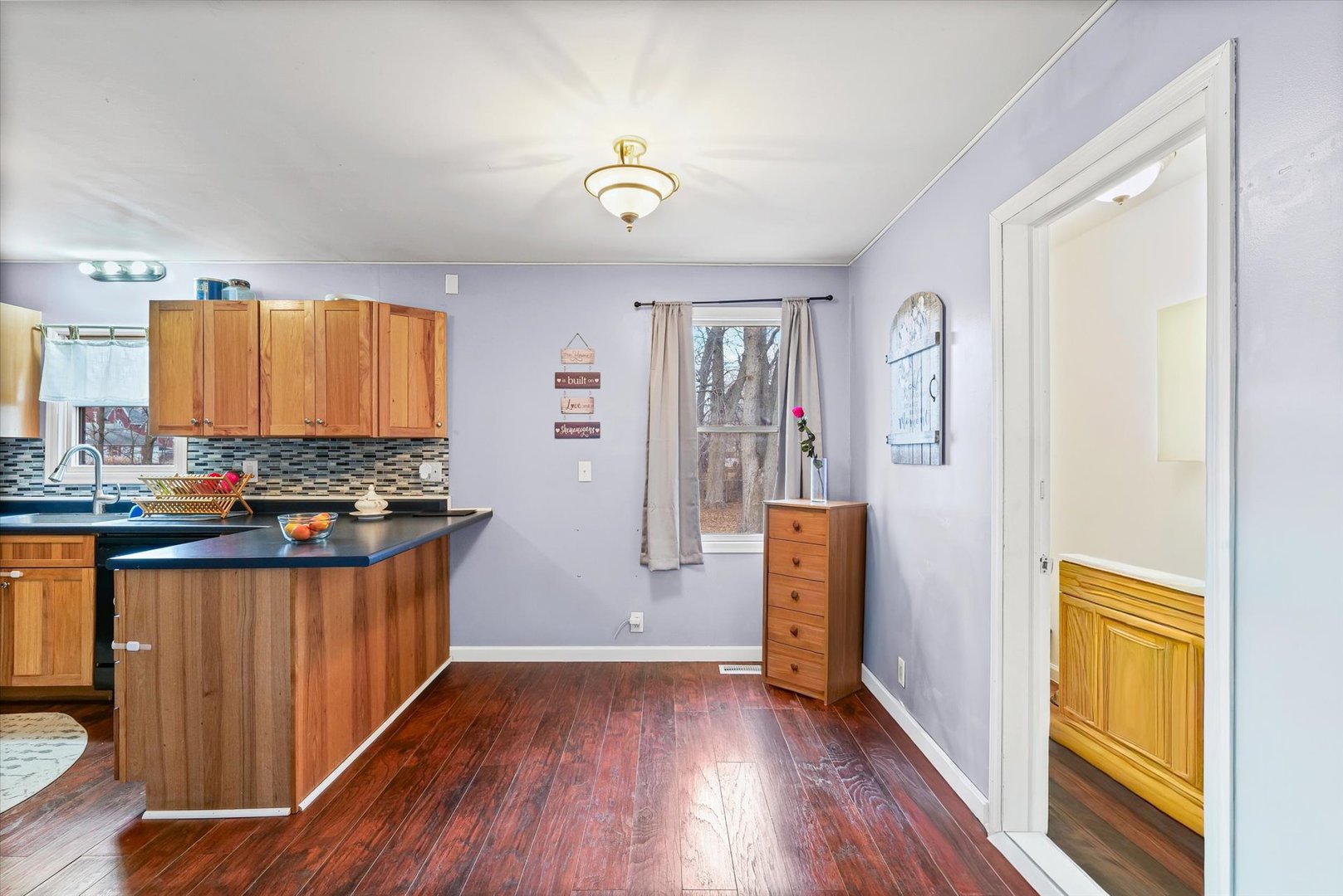 108 Maple Street Roberts, IL 60962 - Photo 14 of 28 a view of walk in closet with wooden floor