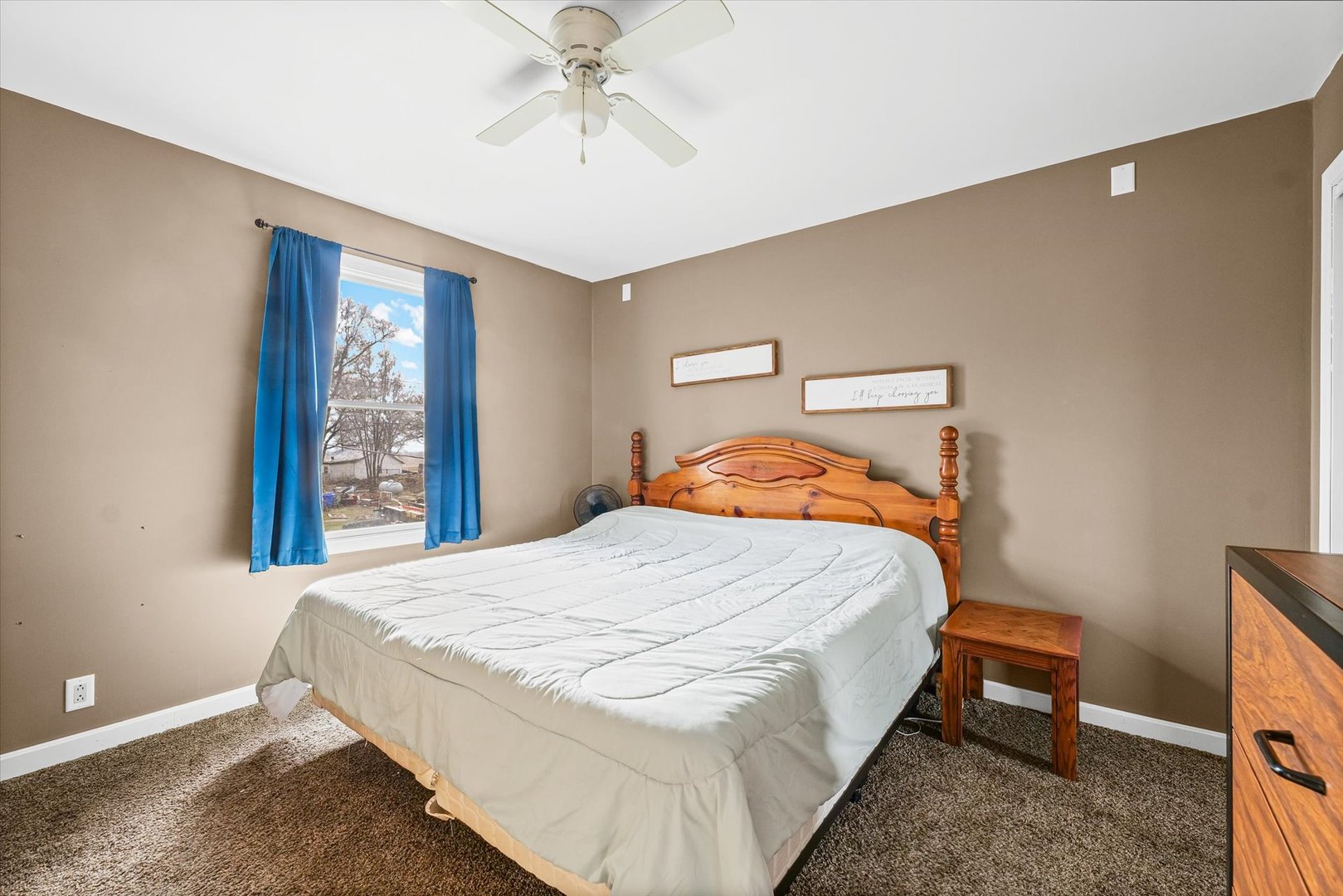 108 Maple Street Roberts, IL 60962 - Photo 17 of 28 a bedroom with a bed and window