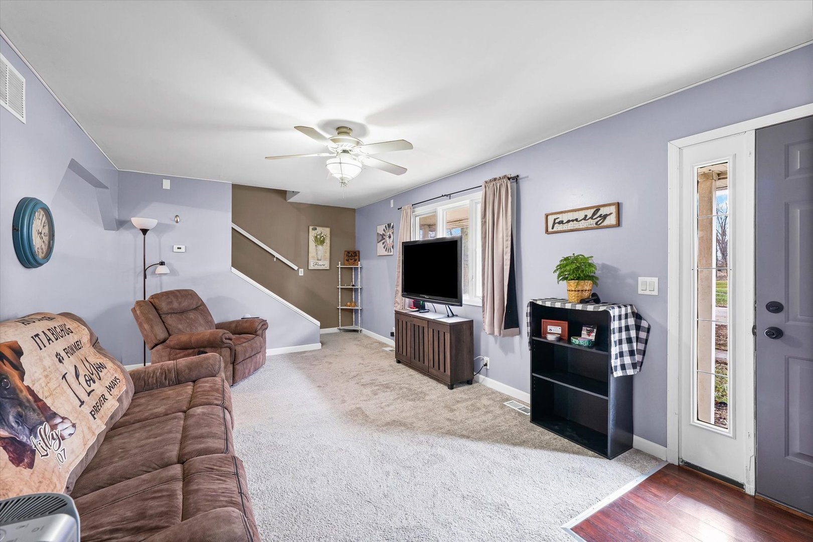 108 Maple Street Roberts, IL 60962 - Photo 5 of 28 a living room with furniture and a flat screen tv