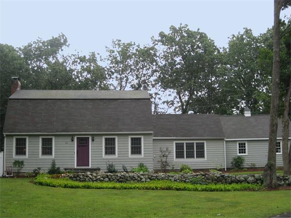 front view of a house with a yard