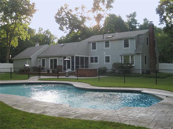 16 Whippletree Road Chelmsford, MA 01824 - Photo 2 of 22 a front view of a house with a yard