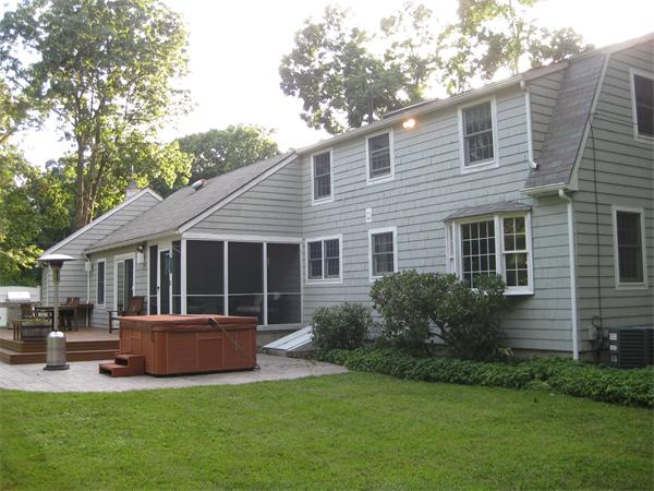 16 Whippletree Road Chelmsford, MA 01824 - Photo 21 of 22 a view of a house with a yard and a garden