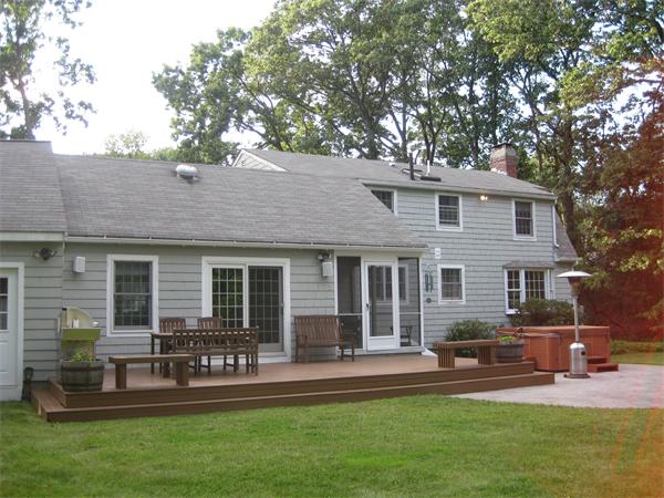 16 Whippletree Road Chelmsford, MA 01824 - Photo 22 of 22 a front view of house with yard and outdoor seating